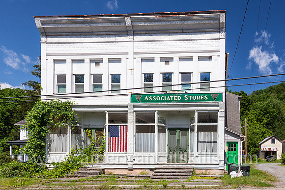 The long vacant Associated Stores of J. M. Schmidt & Sons Co. Inc. can be seen within the small Sullivan County hamlet of North Branch.