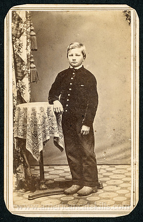 Portrait of a young boy taken by photographer L. B. Silver of Salem, Ohio.