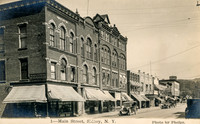 Vintage postcard titled "1_Main Street, Sidney, N. Y." by photographer Charles H. Phelps.
