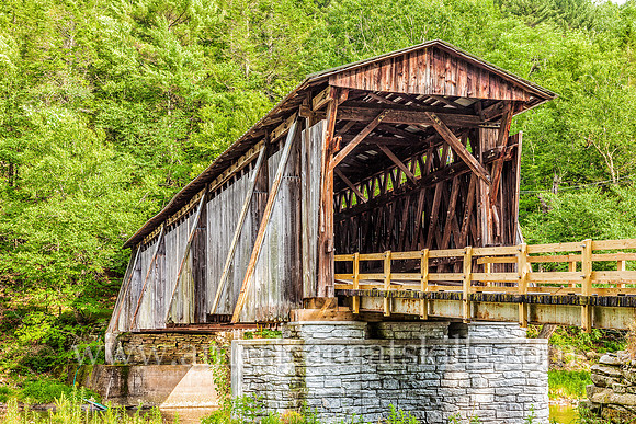 Halls Mills Covered Bridge, located near Claryville, New York, was built in 1912 by David Benton and John Knight.