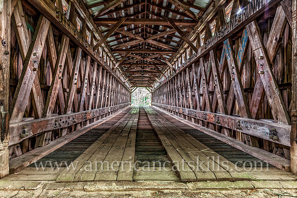 Halls Mills Covered Bridge, located near Claryville, New York, was built in 1912 by David Benton and John Knight.