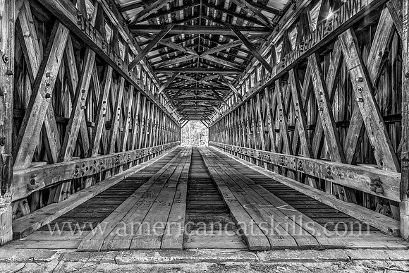 Halls Mills Covered Bridge, located near Claryville, New York, was built in 1912 by David Benton and John Knight.