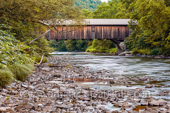 The Livingston Manor Covered Bridge, formerly known as the Mott Flats Bridge and more recently as the Vantran Bridge, was originally built in 1860 by John Davidson.