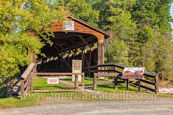 The historic Perrine’s Covered Bridge, constructed in 1835 by Benjamin Wood, crosses the Wallkill River in the hamlet of Rifton in Ulster County, New York.