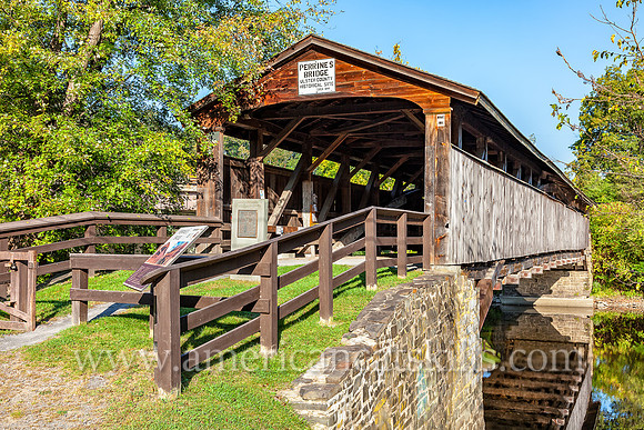 The historic Perrine’s Covered Bridge, constructed in 1835 by Benjamin Wood, crosses the Wallkill River in the hamlet of Rifton in Ulster County, New York.