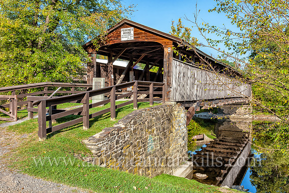 The historic Perrine’s Covered Bridge, constructed in 1835 by Benjamin Wood, crosses the Wallkill River in the hamlet of Rifton in Ulster County, New York.