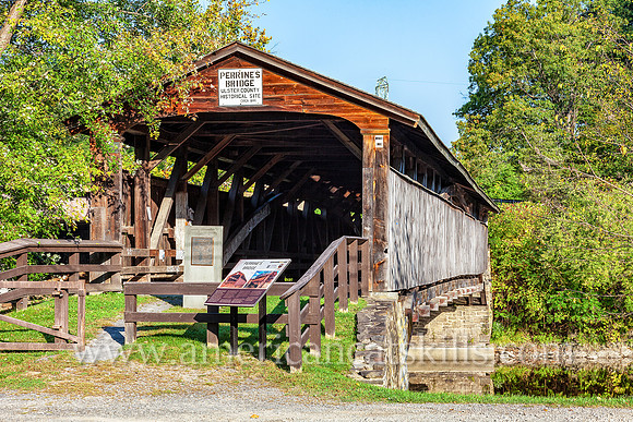 The historic Perrine’s Covered Bridge, constructed in 1835 by Benjamin Wood, crosses the Wallkill River in the hamlet of Rifton in Ulster County, New York.
