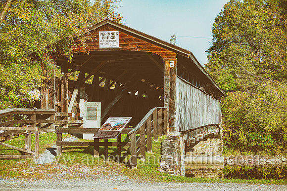 The historic Perrine’s Covered Bridge, constructed in 1835 by Benjamin Wood, crosses the Wallkill River in the hamlet of Rifton in Ulster County, New York.