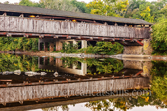 The historic Perrine’s Covered Bridge, constructed in 1835 by Benjamin Wood, crosses the Wallkill River in the hamlet of Rifton in Ulster County, New York.