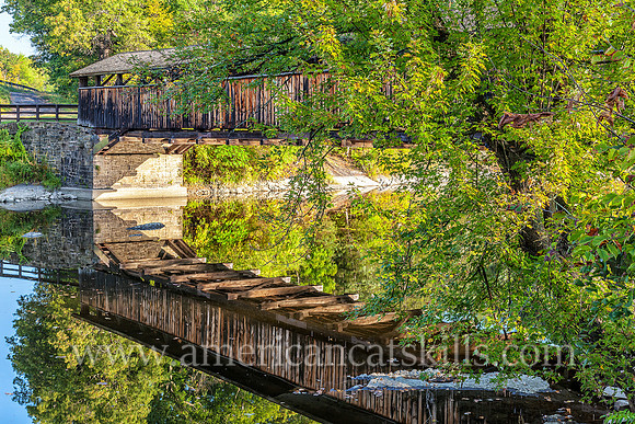 The historic Perrine’s Covered Bridge, constructed in 1835 by Benjamin Wood, crosses the Wallkill River in the hamlet of Rifton in Ulster County, New York.