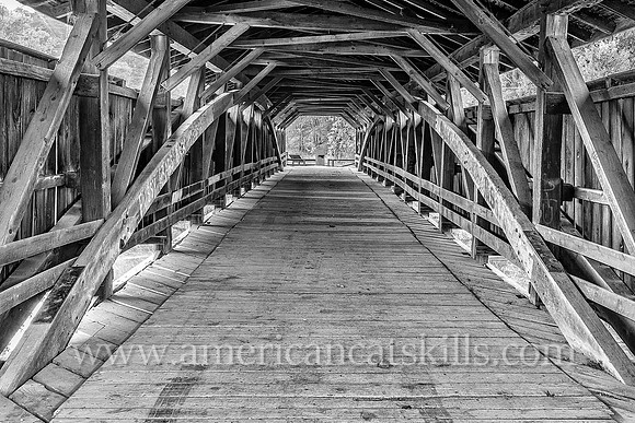 The historic Perrine’s Covered Bridge, constructed in 1835 by Benjamin Wood, crosses the Wallkill River in the hamlet of Rifton in Ulster County, New York.