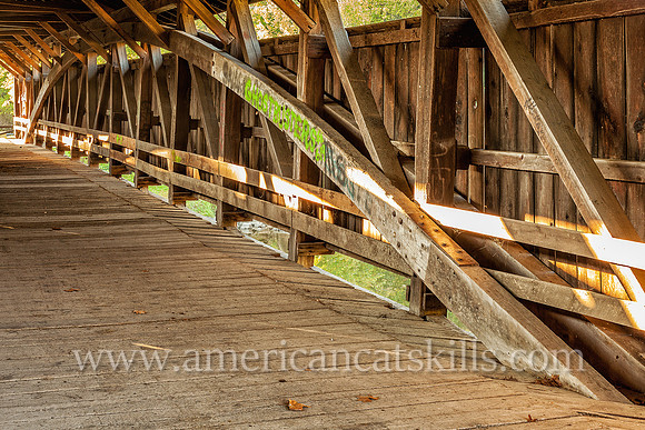 The historic Perrine’s Covered Bridge, constructed in 1835 by Benjamin Wood, crosses the Wallkill River in the hamlet of Rifton in Ulster County, New York.