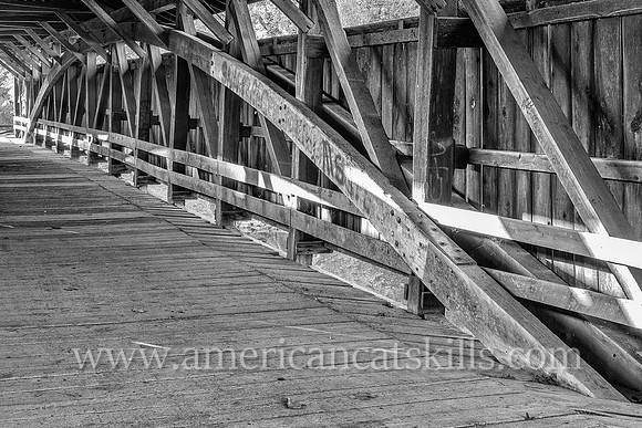 The historic Perrine’s Covered Bridge, constructed in 1835 by Benjamin Wood, crosses the Wallkill River in the hamlet of Rifton in Ulster County, New York.