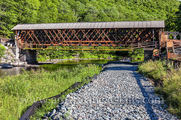 The Beaverkill Covered Bridge, seen here with exposed town lattice trusses due to the removed siding, underwent a major restoration project between 2015 and 2017.