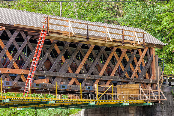 The Beaverkill Covered Bridge, seen here with exposed town lattice trusses due to the removed siding, underwent a major restoration project between 2015 and 2017.