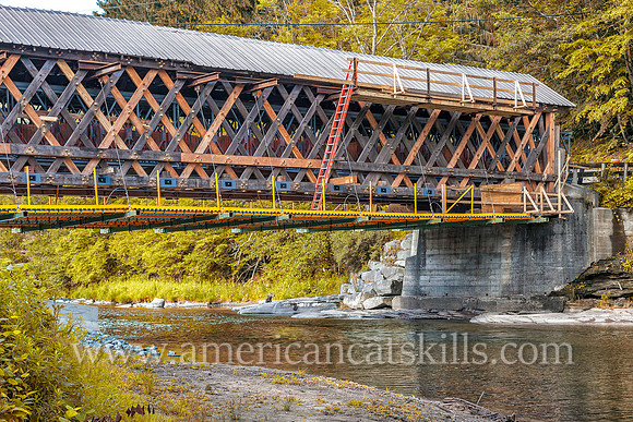 The Beaverkill Covered Bridge, seen here with exposed town lattice trusses due to the removed siding, underwent a major restoration project between 2015 and 2017.