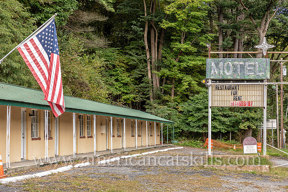 Old fashioned ghost sign for “Motel” at an abandoned motel and restaurant at Pond Eddy in Sullivan County, New York.