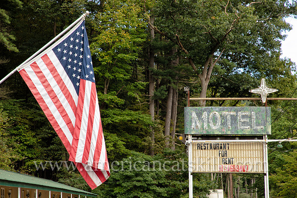 Old fashioned ghost sign for “Motel” at an abandoned motel and restaurant at Pond Eddy in Sullivan County, New York.