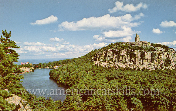 Vintage postcard titled "View of Mohonk Mountain House, Lake and Sky Top from Eagle Cliff, Mohonk Lake" by photographer Ruth H. Smiley.