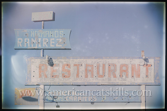 Ghost sign and abandoned restaurant named “Los Hermanos Ramirez” along historic Route 66 (East Amarillo Boulevard) in Amarillo, Texas.