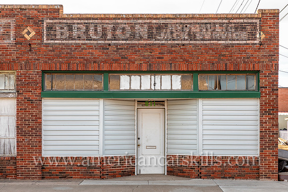 Ghost sign on the front of the building façade at the former Bruton Hydraulic Jack Service business located along historic Route 66 in Amarillo, Texas.