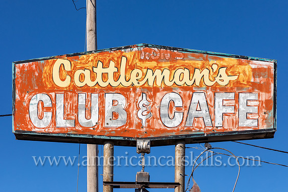 Vintage sign for the Cattleman’s Club and Café located along historic Route 66 (East Amarillo Boulevard) in Amarillo, Texas.