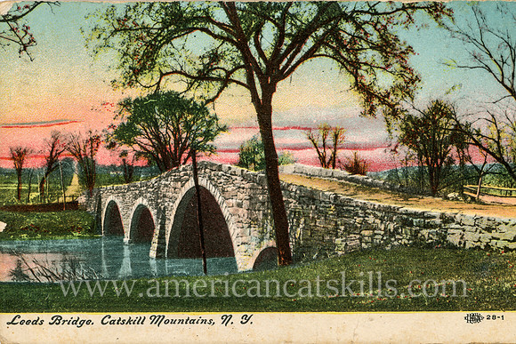 Vintage postcard with a view of the Leeds Bridge, an historic stone arch bridge in the Catskills that spans the Catskill Creek of Leeds in Greene County, New York.