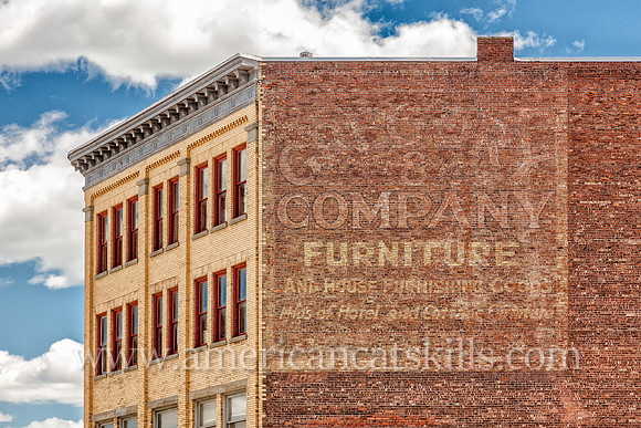 In a testament to the past, this old ghost sign advertises Gregory & Co. in Kingston, New York. Gregory & Co. was a wholesale and retail home and furniture business.