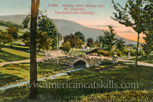 Vintage postcard titled "Stanley Arch Bridge and Mt. Churchill, Stamford-in-the-Catskills."; published by the Barton & Spooner Company.