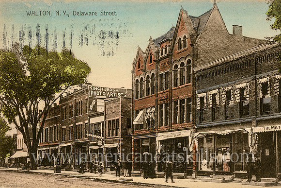 Vintage postcard titled "Walton, N.Y., Delaware Street" that includes the Kinch Brothers photo studio.
