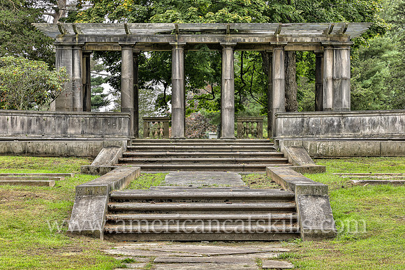 Family plot for the Coykendall family that includes a pergola, stone steps and stone walls at the Montrepose Cemetery in Kingston, New York.