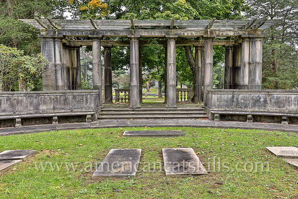 Family plot for the Coykendall family that includes a pergola, stone steps and stone walls at the Montrepose Cemetery in Kingston, New York.