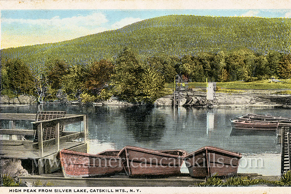 Vintage postcard titled "High Peak from Silver Lake, Catskill Mts., N.Y." that was published by Charles W. Hughes.