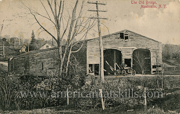 Vintage postcard of an historic covered bridge at Monticello, New York.