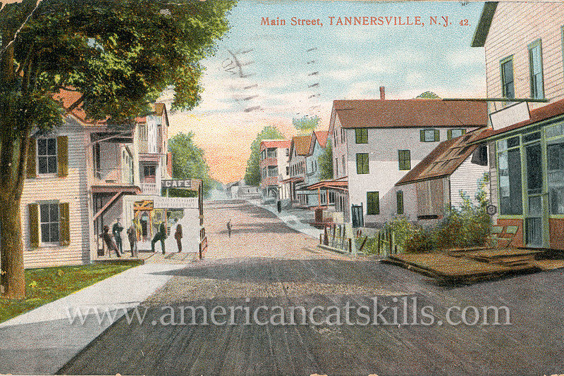Vintage postcard depicting Main Street in Tannersville, New York, including the photography studio of C. O. Bickelmann.