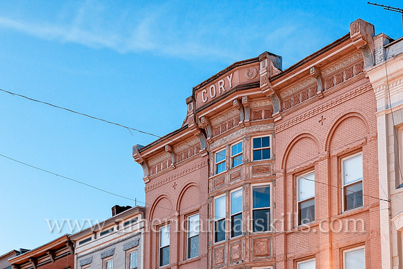 The Cory building on Wall Street in the Stockade District of Kingston, New York was constructed circa 1900 in the Queen Anne architectural style.