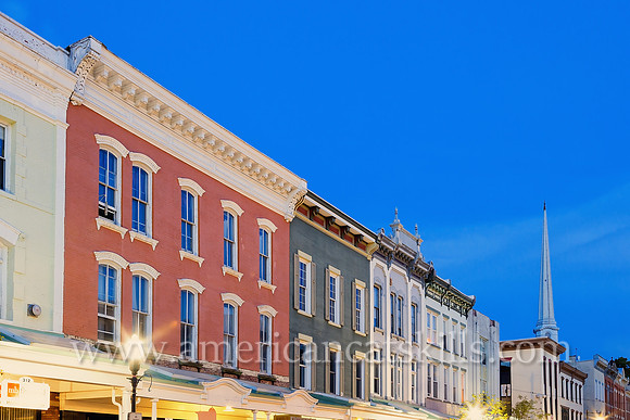 The steeple of the Old Dutch Church rises above the beautiful architecture of Wall Street in the Stockade District of Kingston, New York.