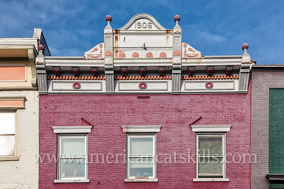 Photograph of a building façade on Wall Street in the historic Stockade District of Kingston, New York.