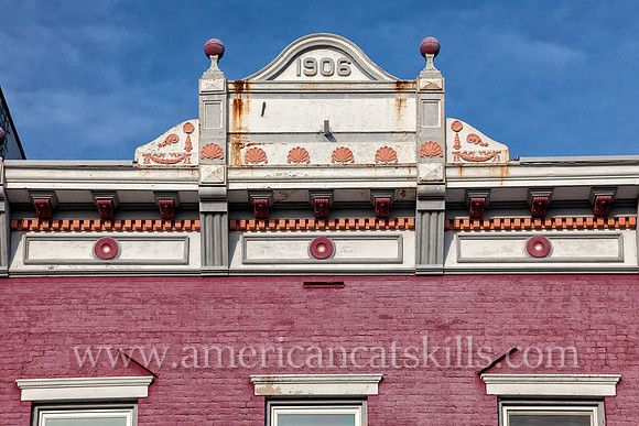 Photograph of a building façade on Wall Street in the historic Stockade District of Kingston, New York.