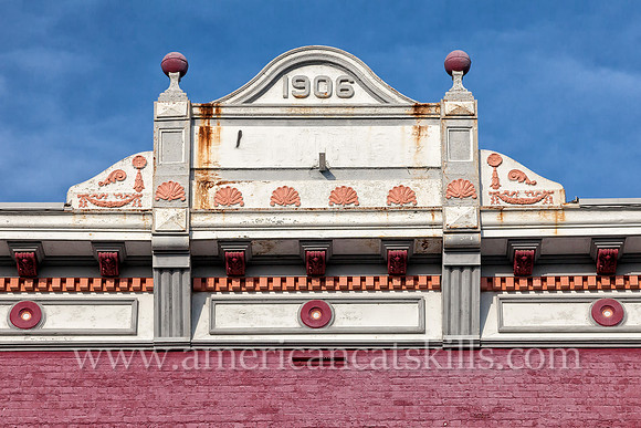 Photograph of a building façade on Wall Street in the historic Stockade District of Kingston, New York.