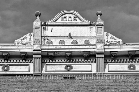 Photograph of a building façade on Wall Street in the historic Stockade District of Kingston, New York.