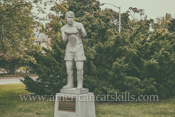 Life-sized, white granite sculpture of Billy Costello, former boxing world champion and native of Kingston, New York.