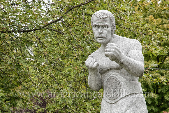 Life-sized, white granite sculpture of Billy Costello, former boxing world champion and native of Kingston, New York.