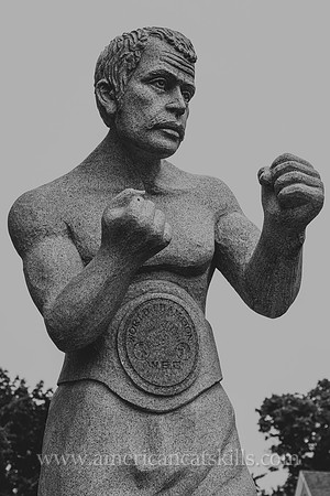 Life-sized, white granite sculpture of Billy Costello, former boxing world champion and native of Kingston, New York.