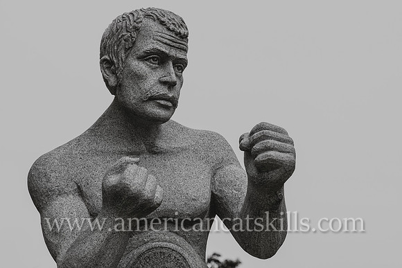 Life-sized, white granite sculpture of Billy Costello, former boxing world champion and native of Kingston, New York.