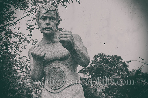Life-sized, white granite sculpture of Billy Costello, former boxing world champion and native of Kingston, New York.