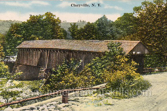 Vintage Catskills postcard depicting the Halls Mills Covered Bridge at Claryville in Sullivan County, New York.