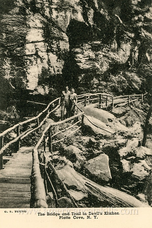 This vintage Catskills postcard published by G. S. Young depicts the wooden pathway leading through the Devil’s Kitchen section of Platte Clove.