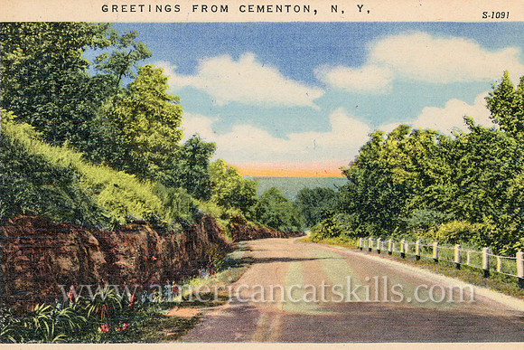 An empty country highway descends the hillside in this vintage postcard titled “Greetings from Cementon, N.Y.”