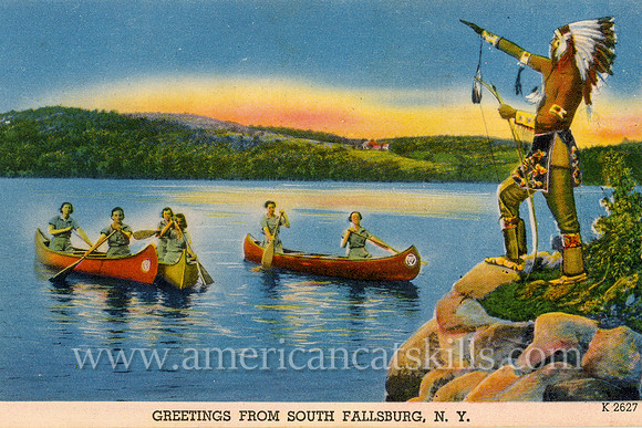 A Native American stands over the lakeside while several canoes with female boaters observe in this vintage postcard titled “Greetings from South Fallsburg, N.Y.”